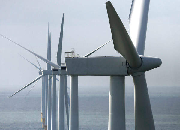 The three-bladed Siemens turbines used in the Burbo offshore wind farm are attached to a rotor of 107m in diameter.